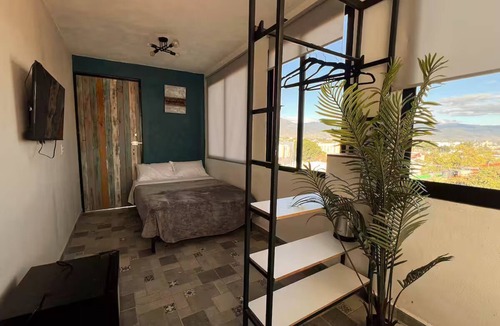 Luis Jimenez Figueroa Apartment | Resting corner with panoramic view of Oaxaca