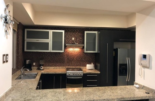 Puerto Vallarta Apartment | Romantic Retreat: Elegant Design, Pool & Open Spaces