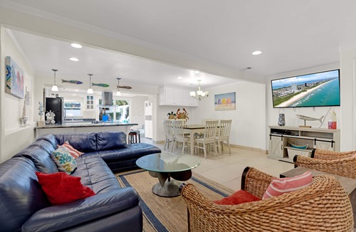 South Padre Island House | Southern Comfort: Beautiful Beach House with Heated Pool. Dog-Friendly and Steps to Beach!
