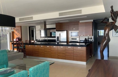 Tres Mares Condo | Spacious 4-bedroom beach front condo with AC in charming Puerto Vallarta.