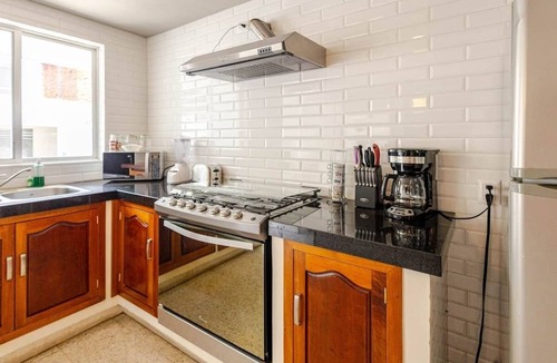 Centro House | Spacious 4BR Home with Parking | Open-Air Patio