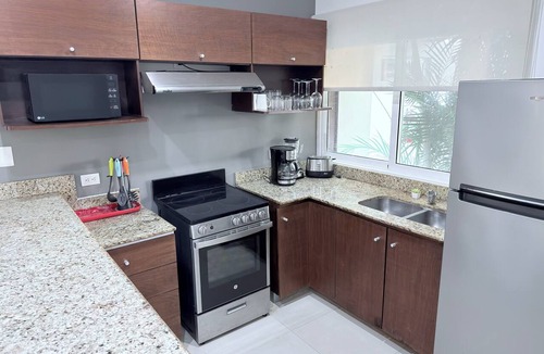 Gonzalo Guerrero Apartment | Spacious condo + Ground floor easypool access + gym + jacuzzi + games area