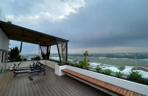 Zona 13 Apartment | STUDIO APARTMENT FEATURING PRIVATE BALCONY NEAR THE AIRPORT