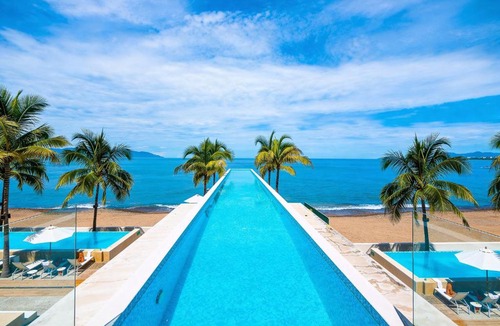 Las Glorias Apartment | Stunning Beachfront Condo - Sea Views & Pools