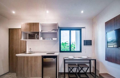 Zazil-ha Apartment | Stylish Condo - Pool + Rooftop - Walk to 5th Ave
