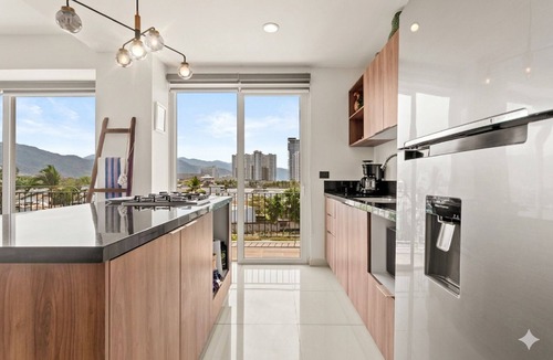 North Hotel Zone Apartment | Stylish Zoho Skies 2-BDR, Rooftop Pool + Parking