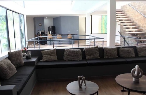 Burgos Bugambilias House | The Glass & Stones Oasis: An Urban Sanctuary