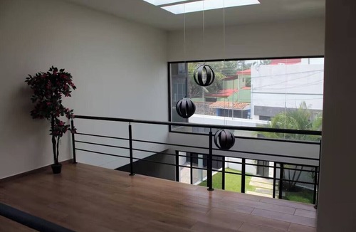 Burgos Bugambilias House | The Glass & Stones Oasis: An Urban Sanctuary