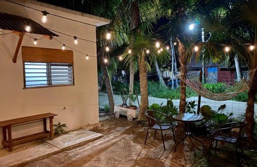 Isla Holbox House | The house of flowers with a courtyard of warm lights