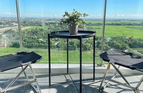 Hue City Centre Apartment | the tourist apartment has 2 bedrooms and a kitchen.