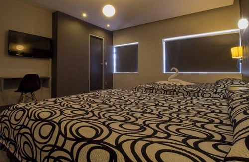 Centro Hotel | Three Comfortable and Airy Rooms with Easy Access to Beach & Local Fun