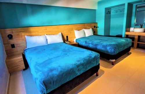 Zona Dorada Hotel | Three Well-Equipped Rooms in a Prime Area Near Dining & Entertainment