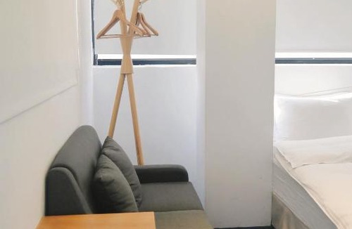 West District Hotel | Time Flyer Hotel