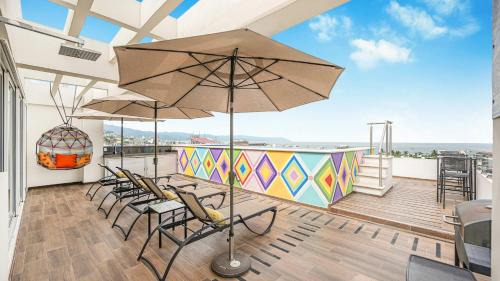 Colonia 5 de Diciembre Apartment | Torre Ku Apartments with Balcony