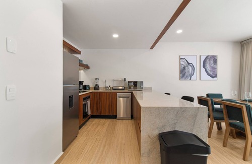 Playa Paraiso Apartment | Tropical 2 Bedroom | Private Balcony & Rooftop | Casago