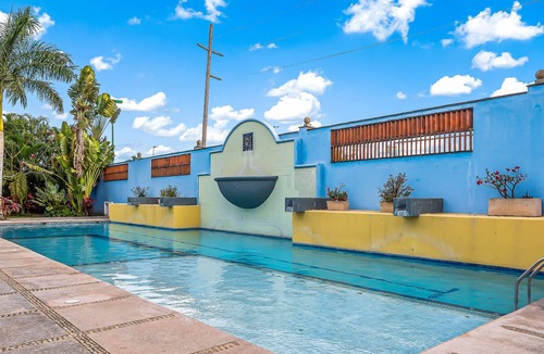 Flamingos House | Vibrant coastal home with private plunge pool & patio + resort pool access