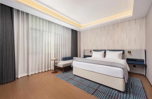 Qiemo Hotel | Wanda Moments Neo,Qiemo