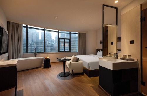 Jeifangbei Central Business District Hotel | Zhihe Xing Hotel