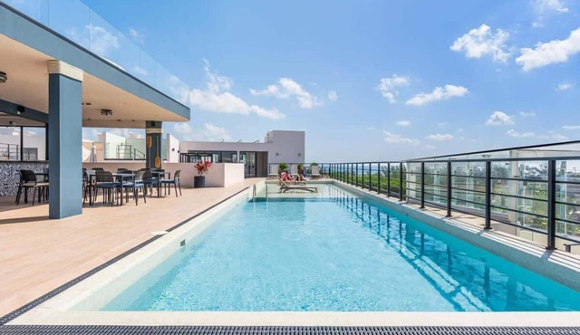 2BR Condo w Private Rooftop Pool Near Beach