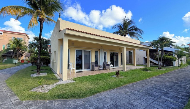 A beautiful villa for in a quiet community, steps from the beach, private pier