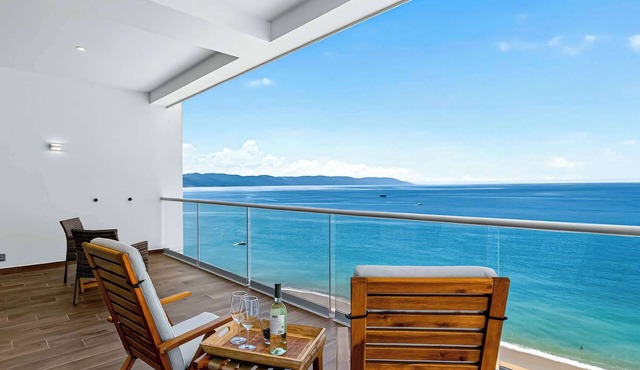Beachfront 2BR - Pools & Scenic Balcony Views