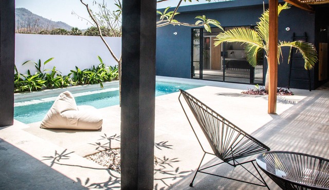 Brutalist Chic Beach Bungalow with Pool