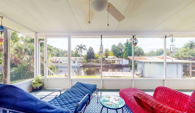 Canal-Front Home with Private Covered Boat Dock & Waterfront Screened Porch in Astor