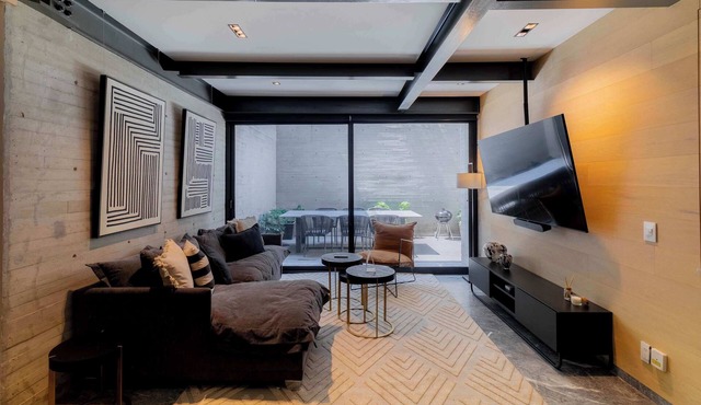 Capitalia | Patio-Connected 1BR Steps from Masaryk