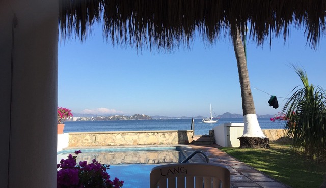 Casa Lang 4 BR/Bath pool on flat calm beach steps to restaurants in secure area.