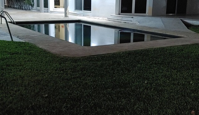 Close to airport, 7 km ~20 mins. Open concept main, modern kitchen, pool palapas