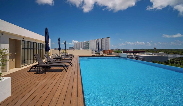 Comfortable with pool and full gym