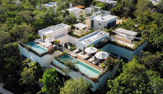 Contemporary 8BR Estate in La Privada | Dual Villas, Private Pools & Beach Access