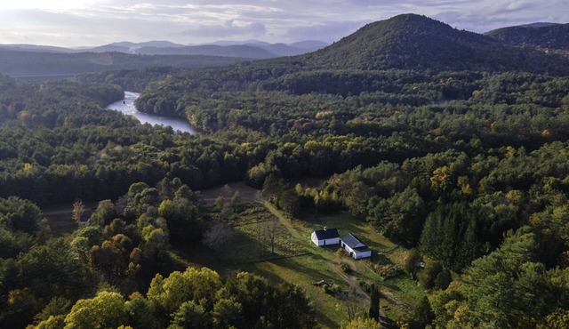 Experience rural bliss near historic Lake George with a six bdm mountain sunset in Corinth