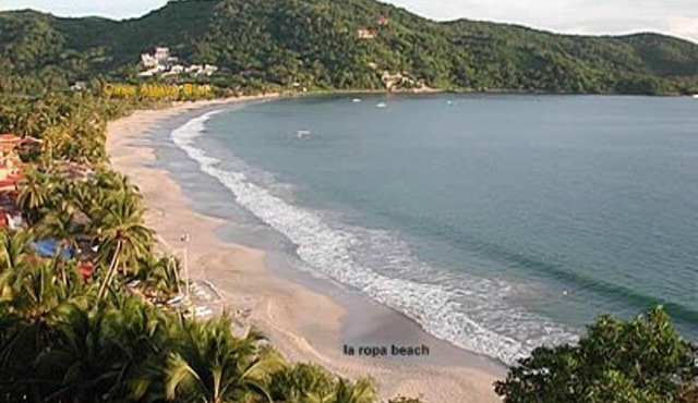 Fabulous views, overlooking beautiful La Ropa Bay; steps from the beach.