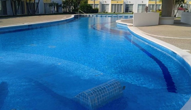 Family house, close to the beach, stores and the airport.