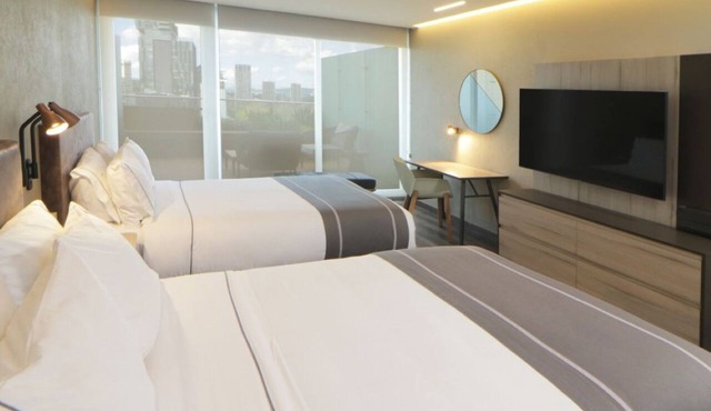 Find Relaxation and Comfort in a Vibrant Guadalajara Room - 3 Units