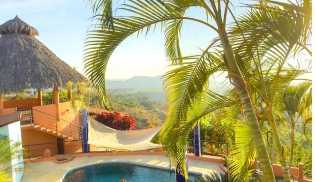 Find tranquility and escape tourism in this hillside home close to beaches