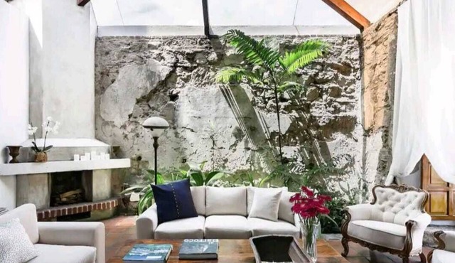 Look up at the stars as you lie on the sofa in this loft apartment