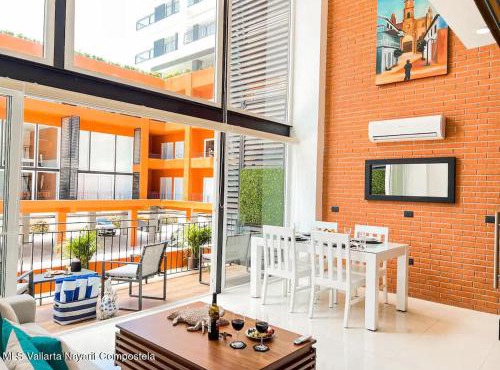 Modern condo loft in Zoho Skies with a roof pool