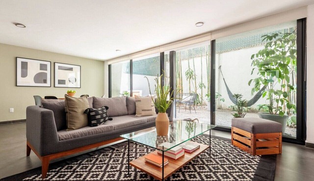 Modern, Industrial Apartment with Bamboo Garden and Rooftop Terrace