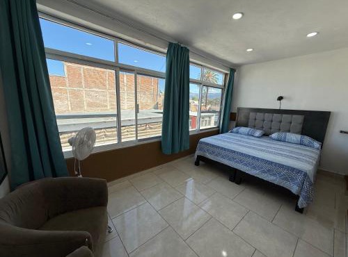 Moderno y Céntrico Loft con Vista a la Ciudad