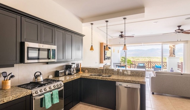 Mountain View 2 Bedroom Residence with Resort Amenities Steps from the Beach!