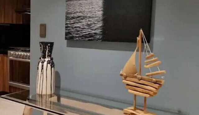 Nautical Apartment's Embrace: Dive into Seaside Now Moments