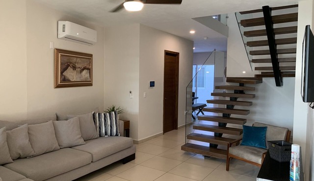 New modern home with parking onsite. Walking disctance from the center plaza