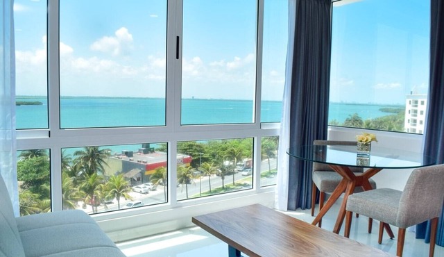 New studio, stunning lagoon views, beach access