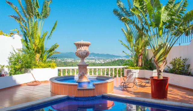 Ocean, mountain, valley, & golf course views. Walk to the beach.