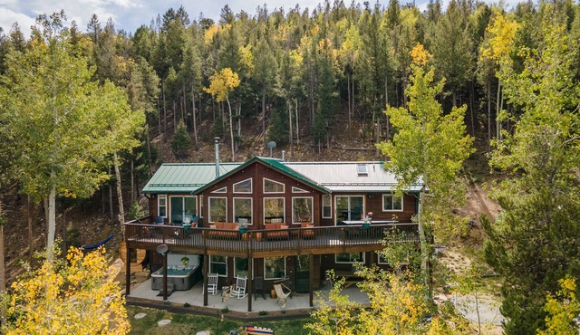 Panoramic Views from a Large Peaktop Retreat with Hot Tub, Sauna, & Axe-Throwing in Conifer