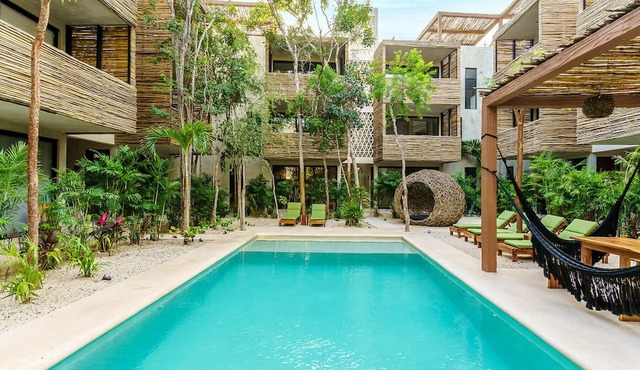 Private Terraces, Full Kitchen, 2 Pools & Parking!