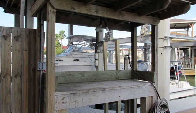 Red Fish Condo B, with boat slips and pool.