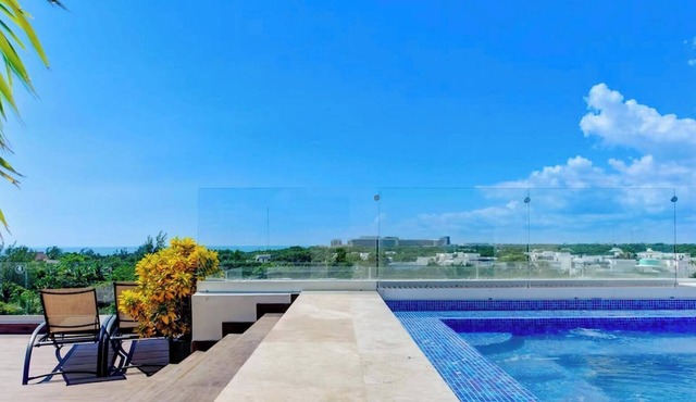 Rooftop relaxation | Pool | Ocean & Jungle Views